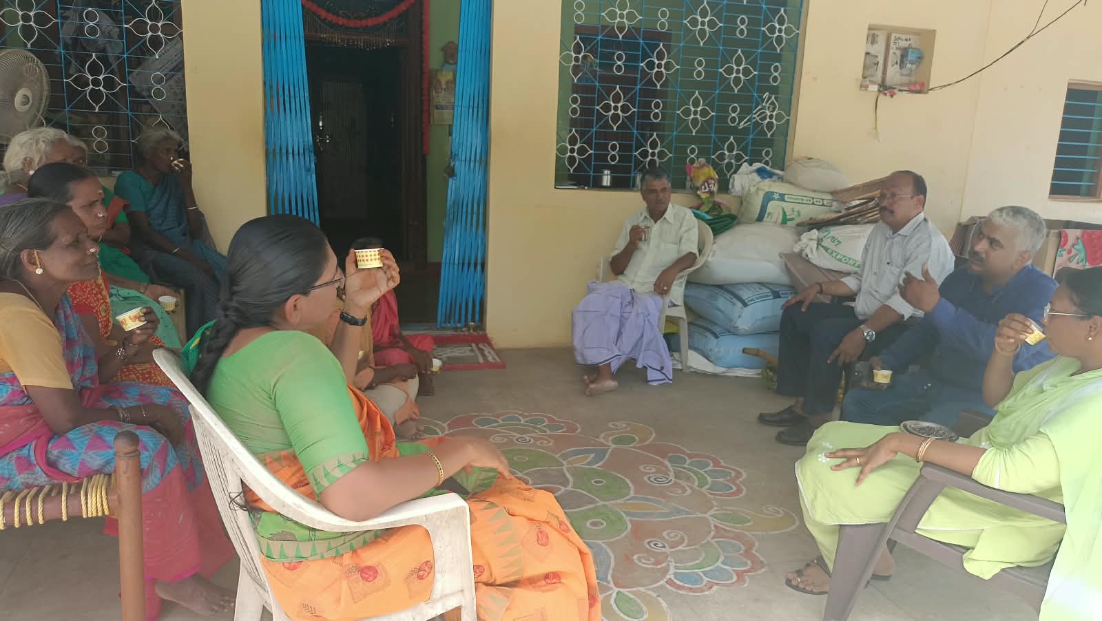 Organic cultivation team meeting near Sambalpatti